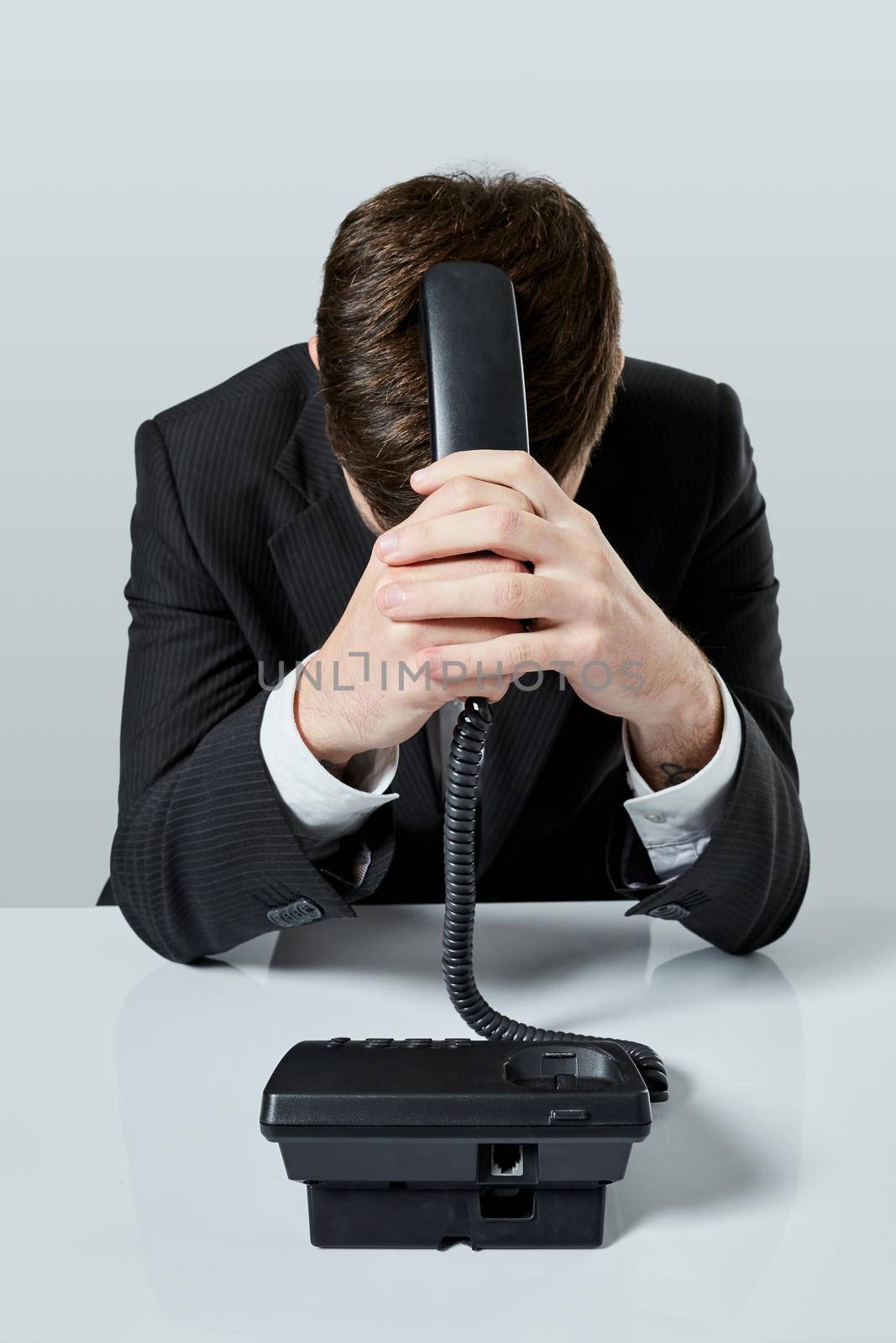 Stressed manager with a telephone by nazarovsergey