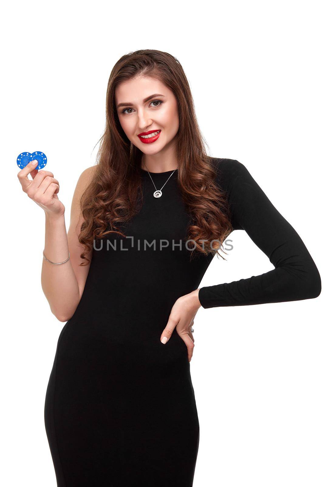 Sexy curly hair brunette in black dress posing with chips in her hands, poker concept isolation on white background Casino, poker, Roulette Blackjack Spin.