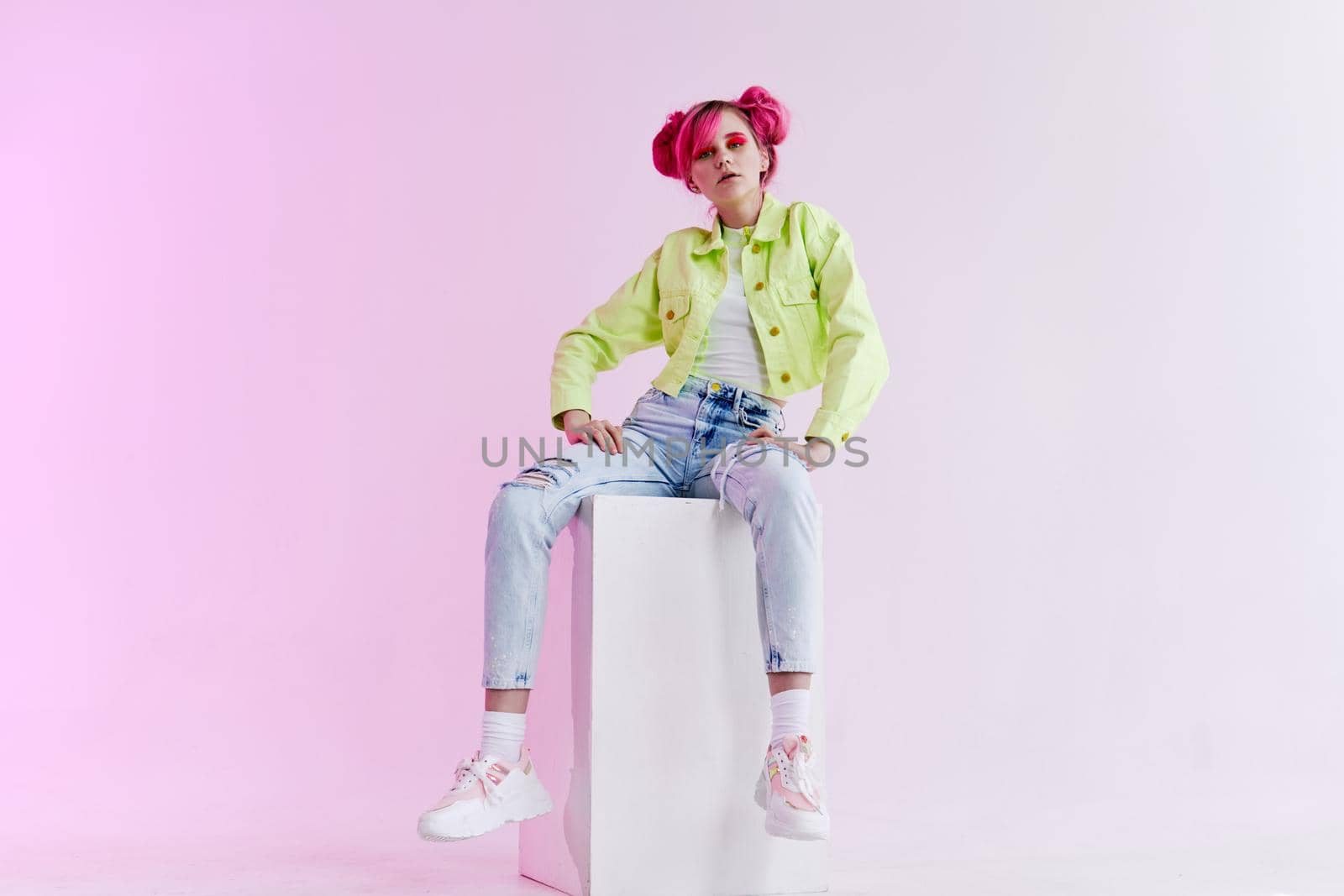 woman with pink hair teen fashionable clothes posing neon. High quality photo