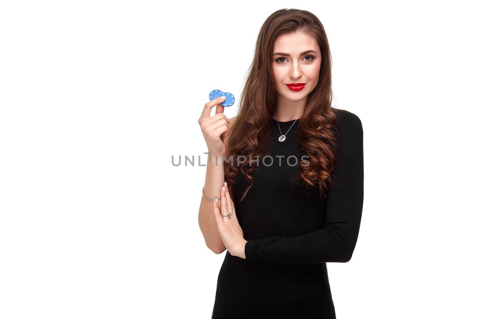 Sexy curly hair brunette posing with chips in her hands, poker concept isolation on white background by nazarovsergey