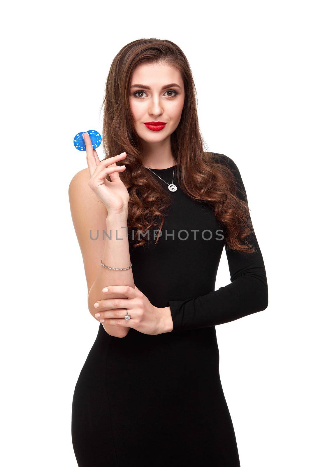 Sexy curly hair brunette in black dress posing with chips in her hands, poker concept isolation on white background Casino, poker, Roulette Blackjack Spin.