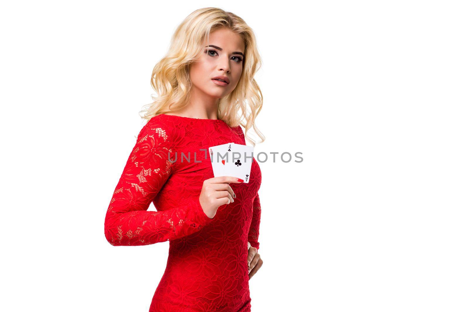 Caucasian young woman with long light blonde hair in evening outfit holding playing cards. Isolated. Poker by nazarovsergey