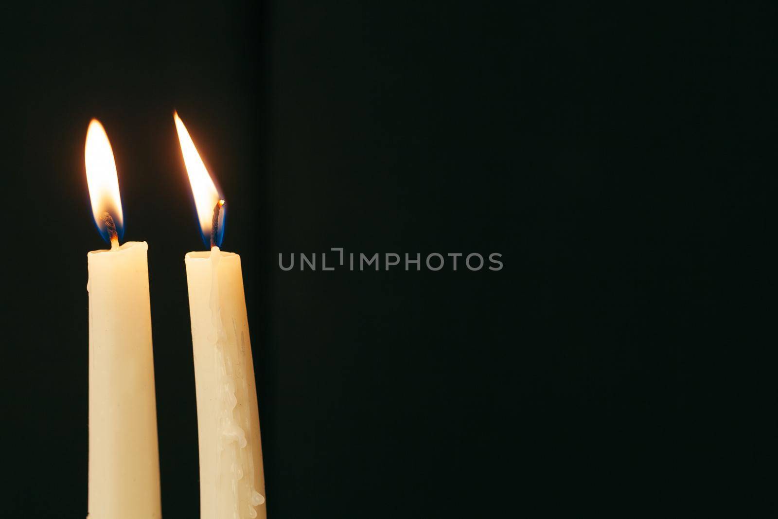 Candle flame close up on a black background