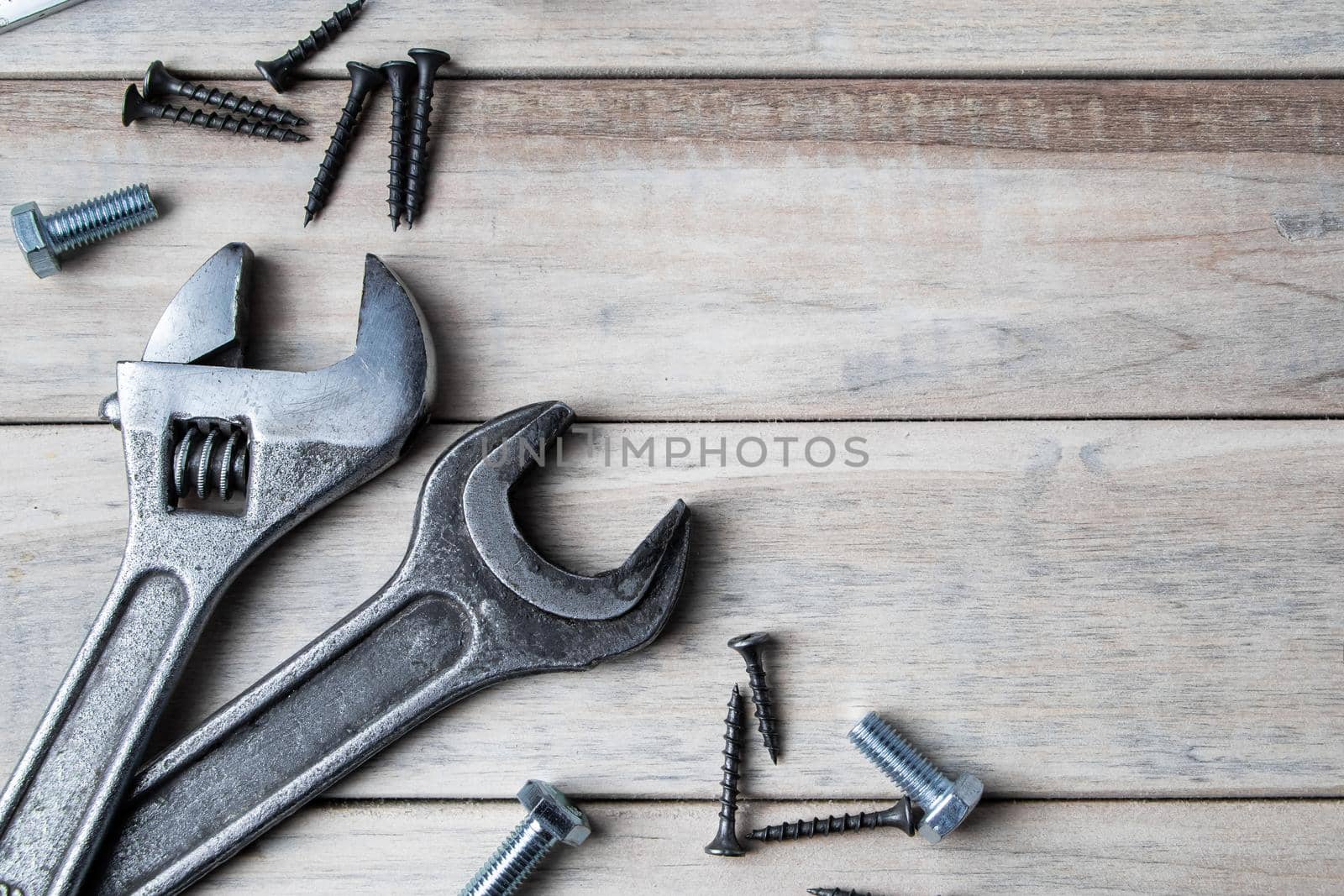 International Father's Day. Greeting card. Work tools on a gray wooden background.
