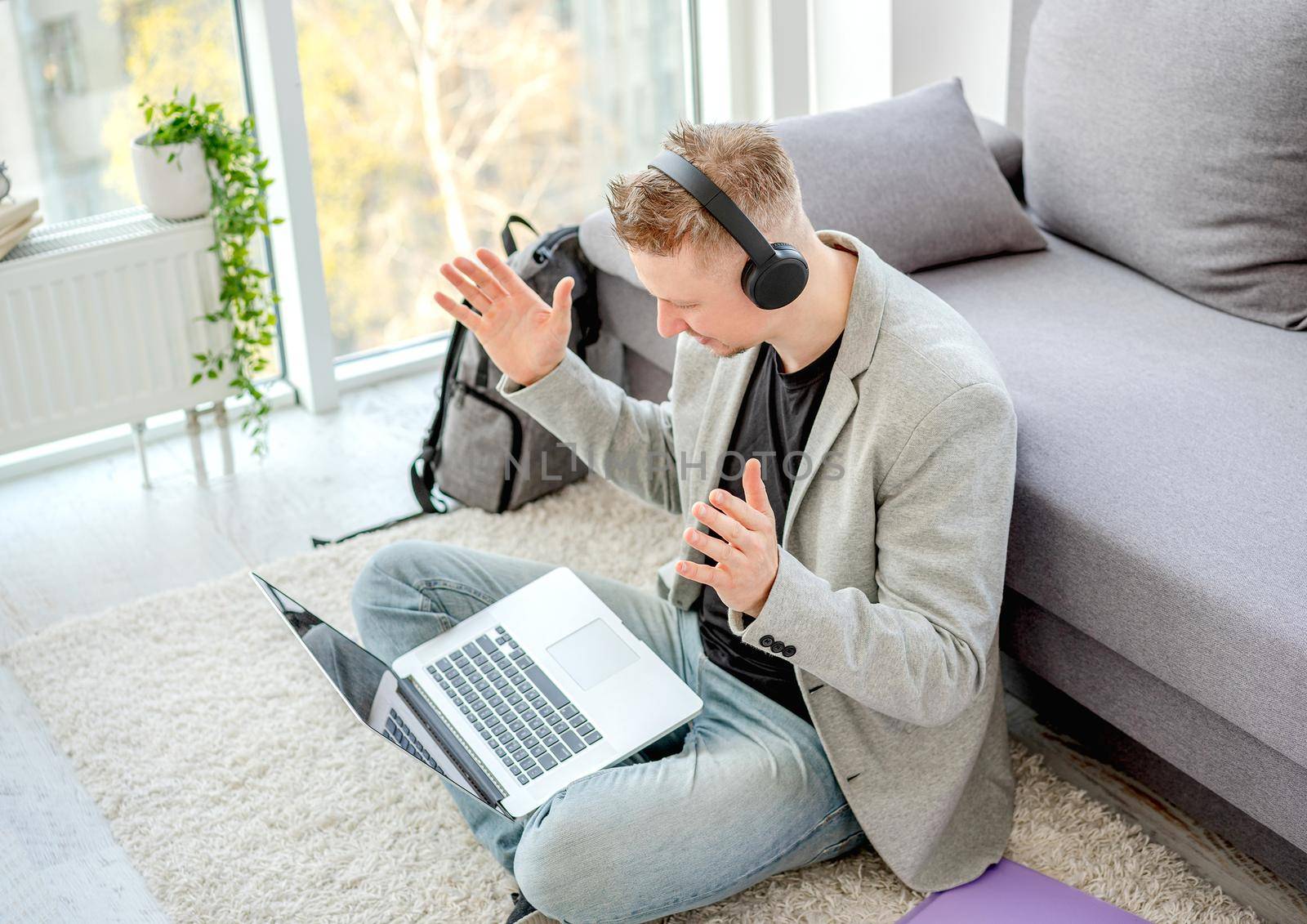 Man teleworking using online communication by tan4ikk1