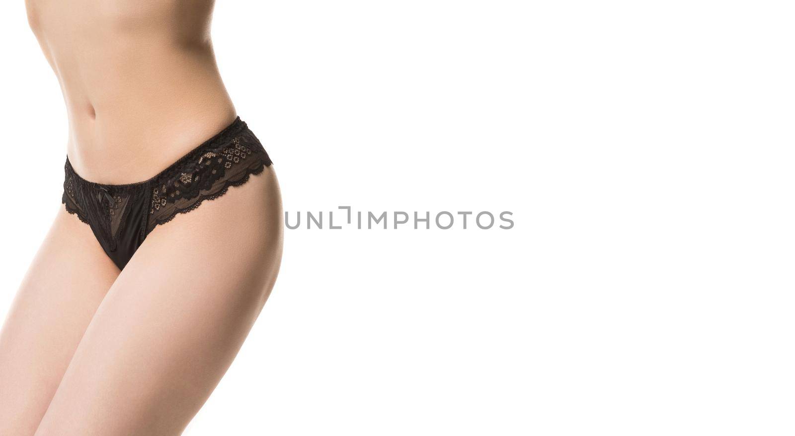 girl in panties, half-length shot on white background.