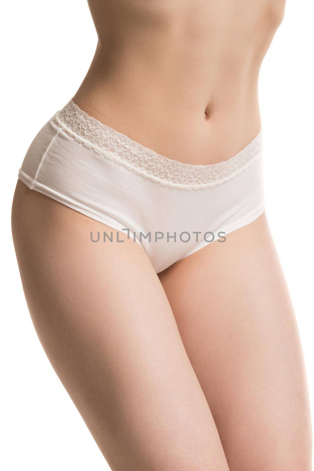 girl in panties, half-length shot on white background.