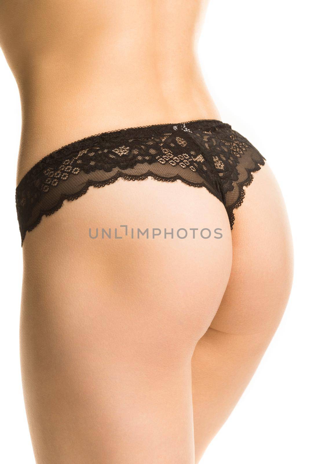 girl in panties, half-length shot on white background.