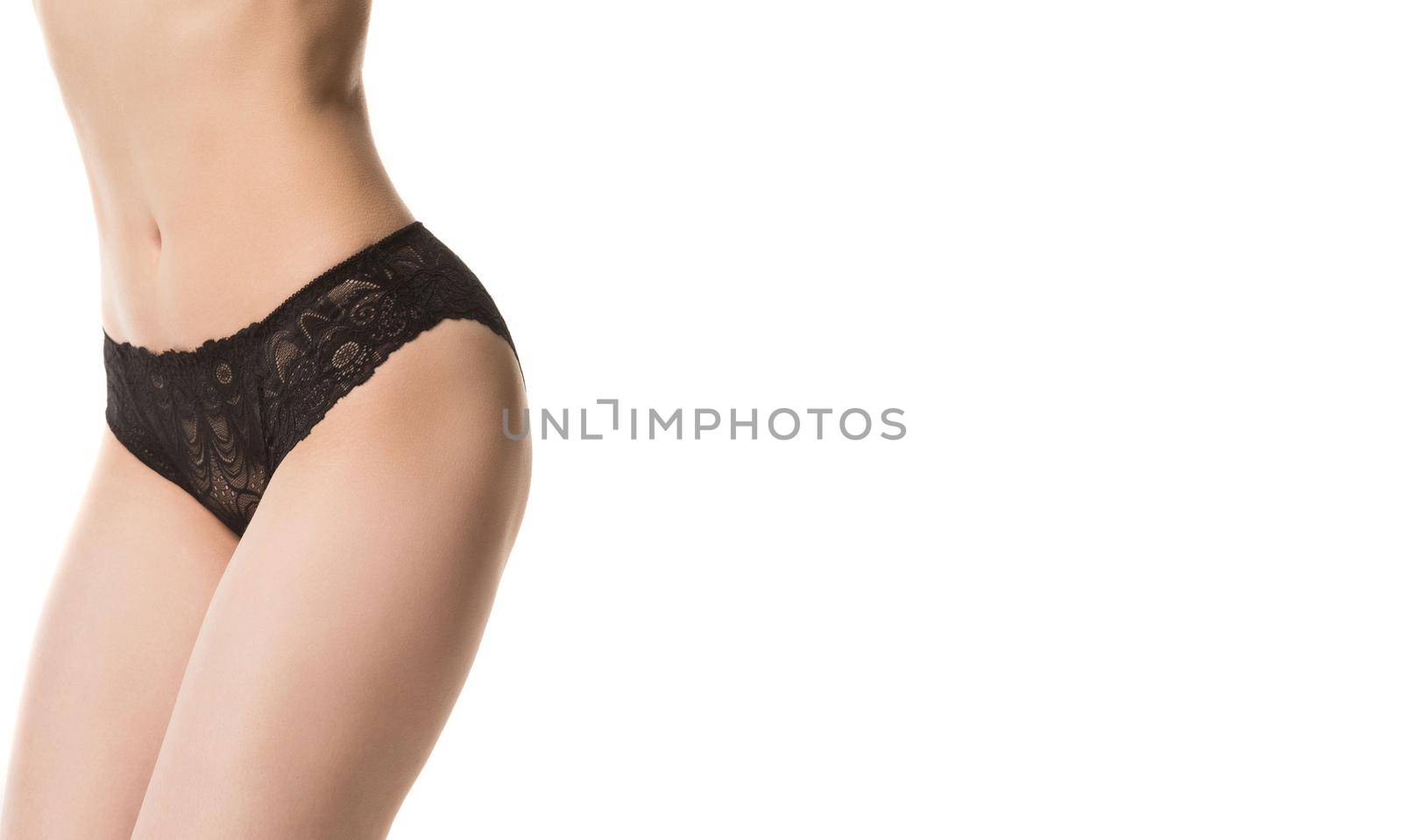 girl in panties, half-length shot on white background.