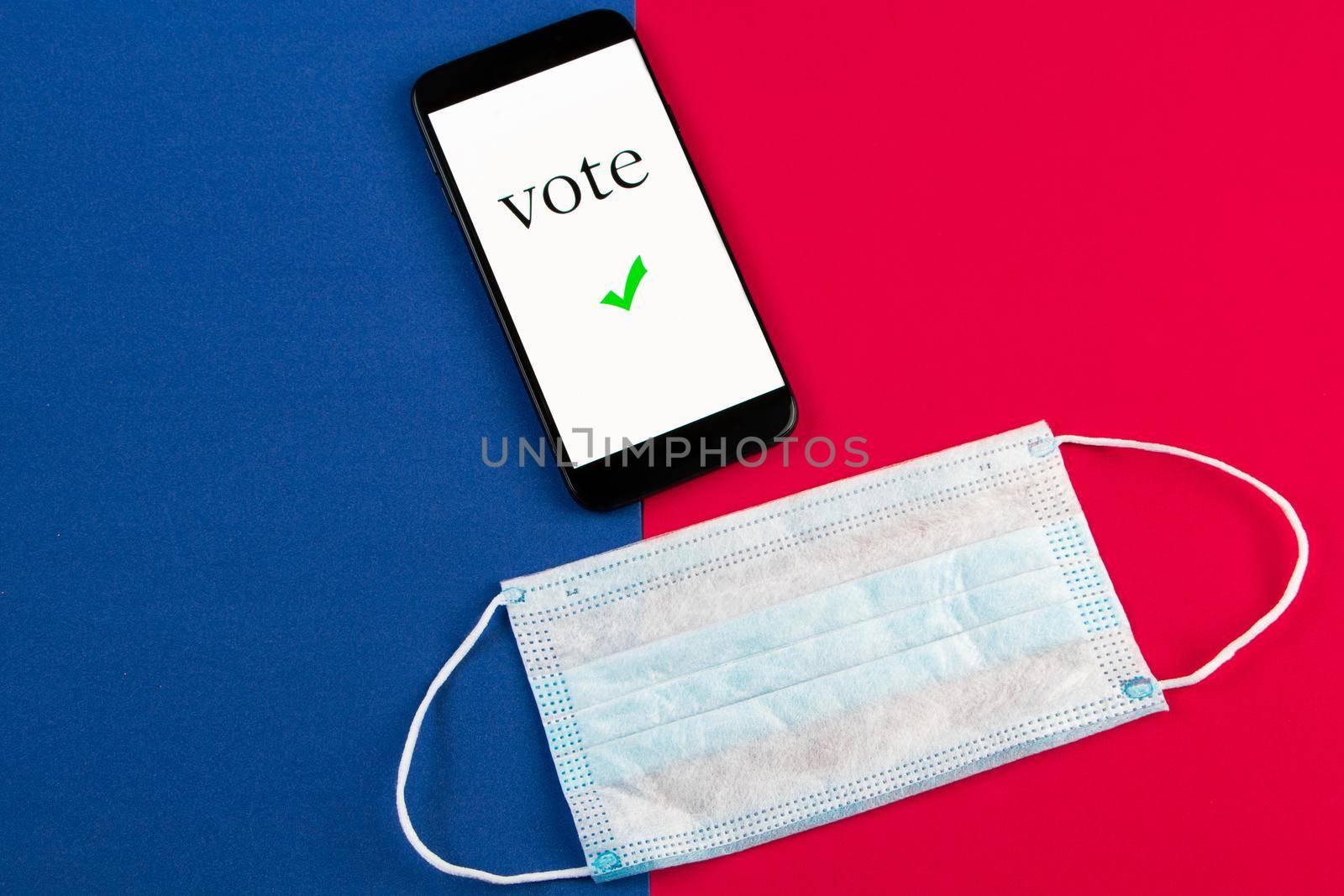 Online voting concept for elections, phone and medical protective mask. by Statuska
