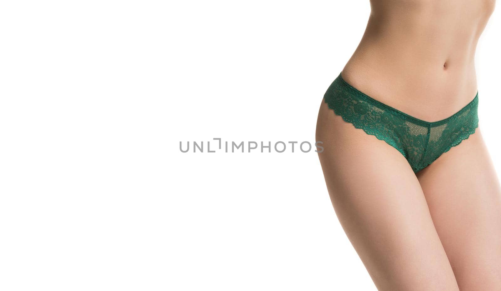 girl in panties, half-length shot on white background.