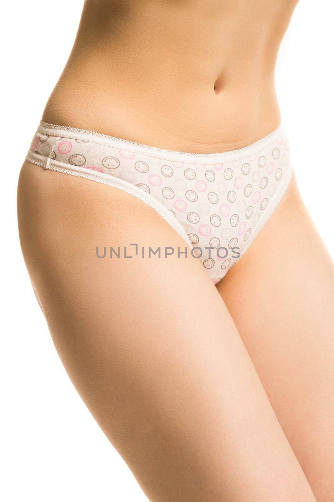 girl in panties, half-length shot on white background.