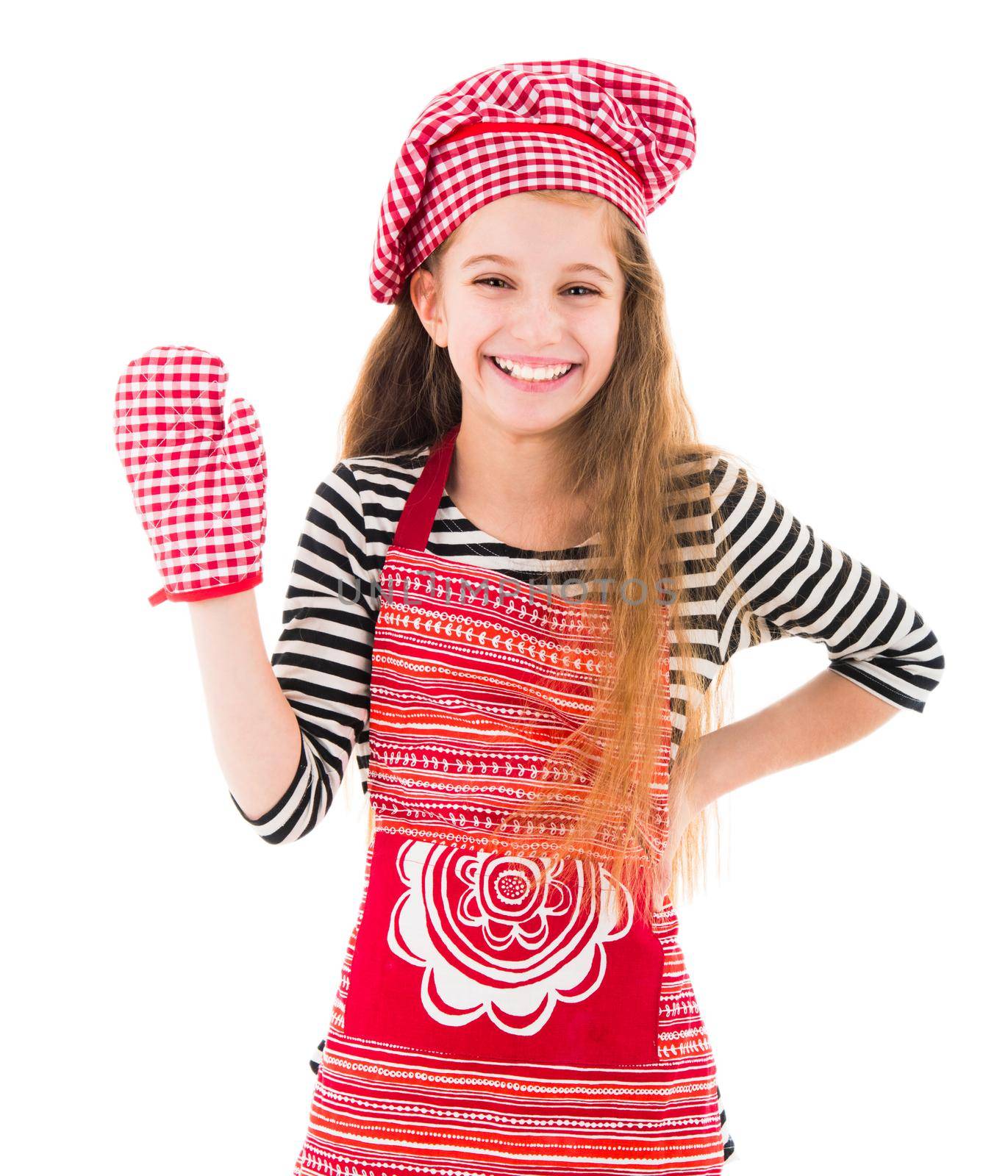 Little positive girl in red apron and red baking glove waving isolated on white background