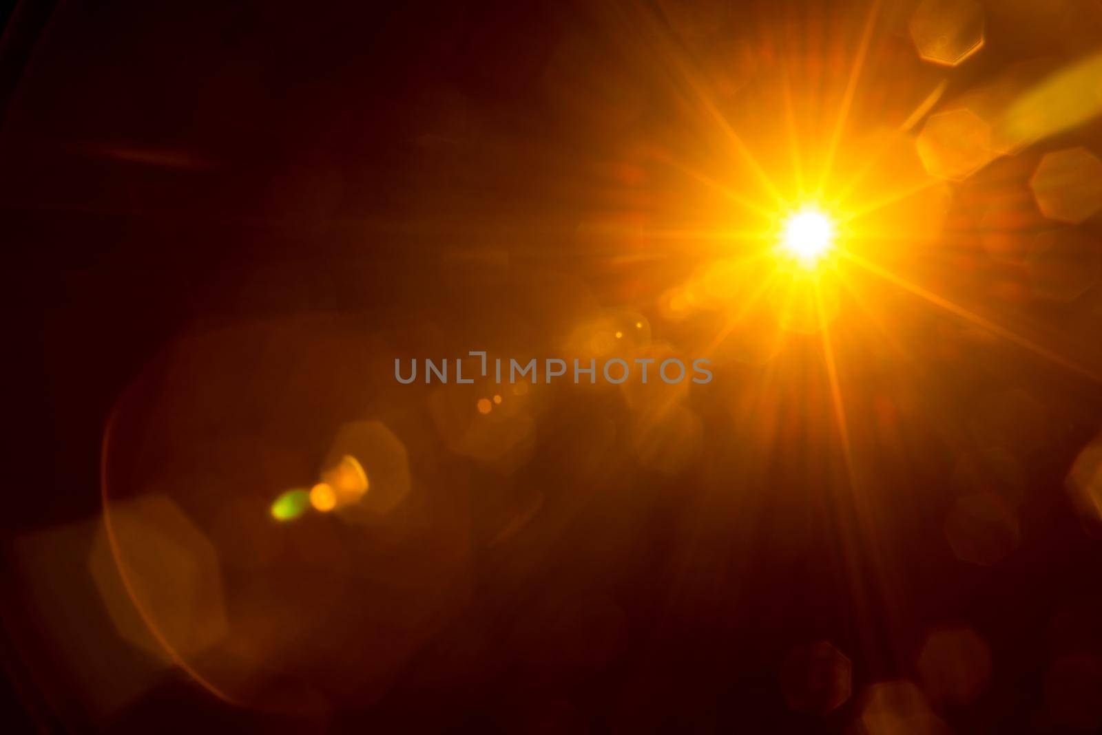 Abstract Natural Sun flare on the black.