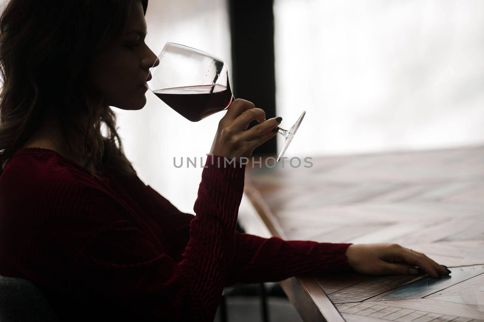 The girl is drinking red wine by Demkat