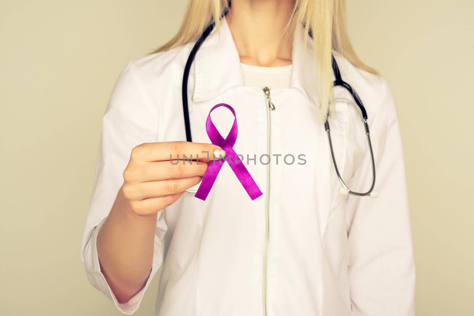 Female doctor in white uniform with purple awareness of ribbon in hand for ADD,ADHD,Alzheimer Disease ,Arnold Chiari Malformation,Childhood Hemiplegia stroke, Epilepsy, Chronic Acute Pain,Crohns - Image
