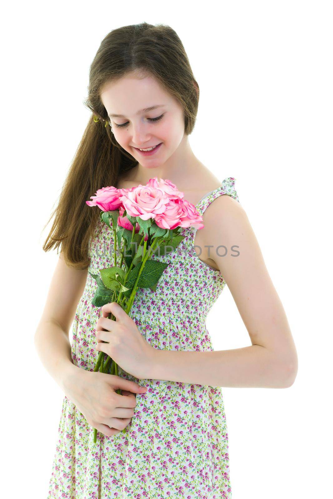 Little girl with a beautiful bouquet of flowers. The concept of holidays, family and children. Isolated on white background.