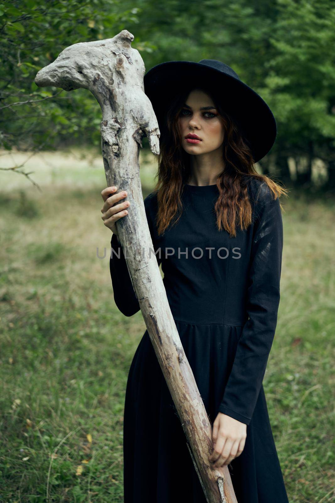 woman in witch costume fantasy magic forest posing by Vichizh