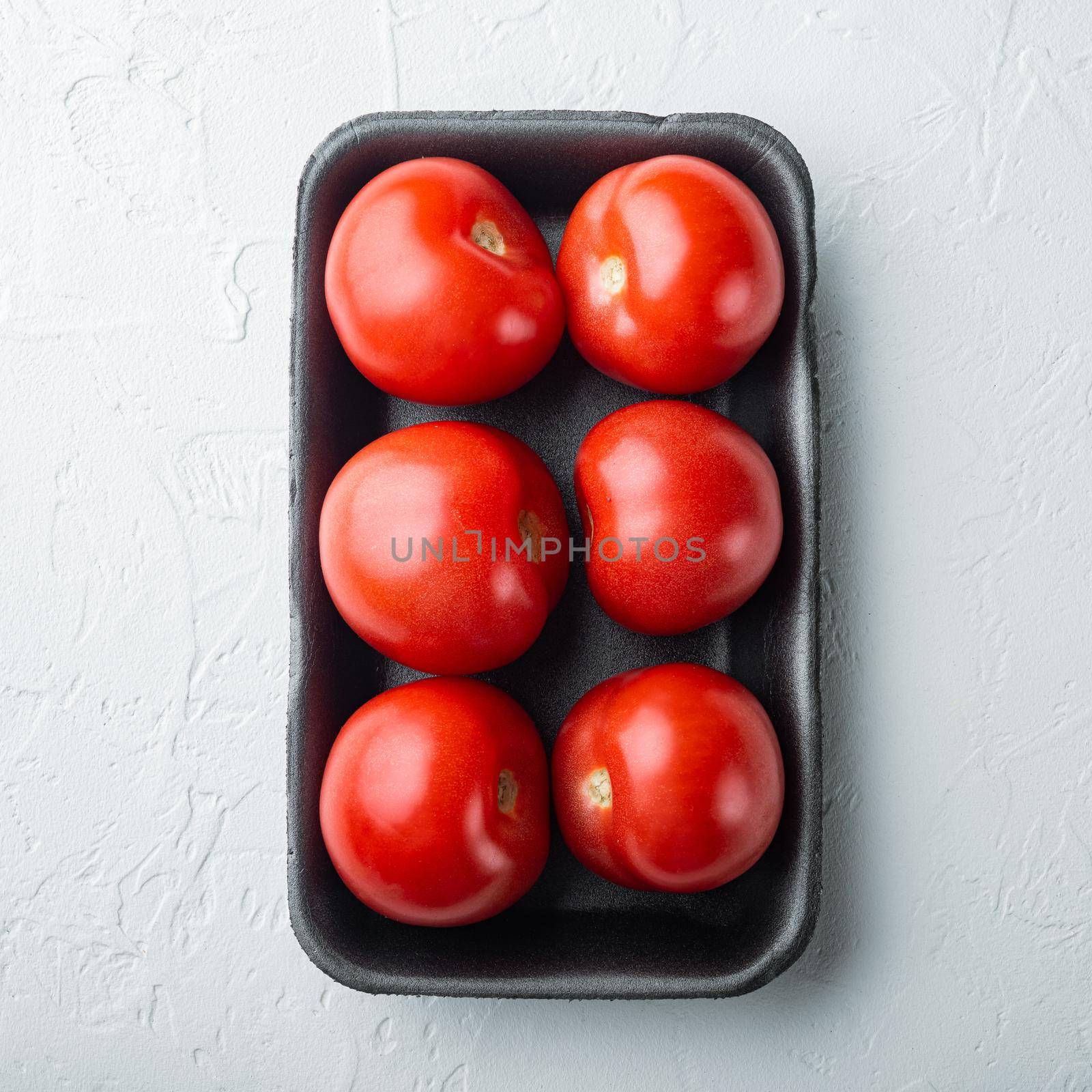 Red tomatoes, on white background