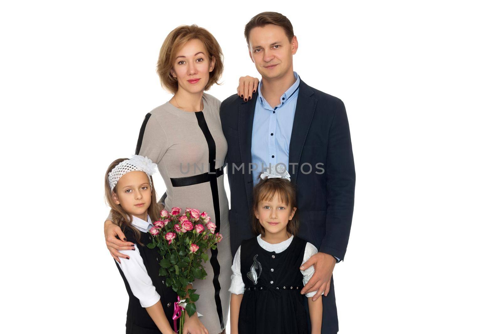 Parents with two adorable daughters - Isolated on white background