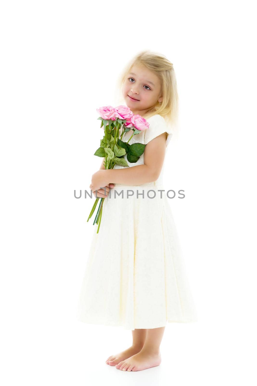 Little girl with a beautiful bouquet of flowers. The concept of holidays, family and children. Isolated on white background.