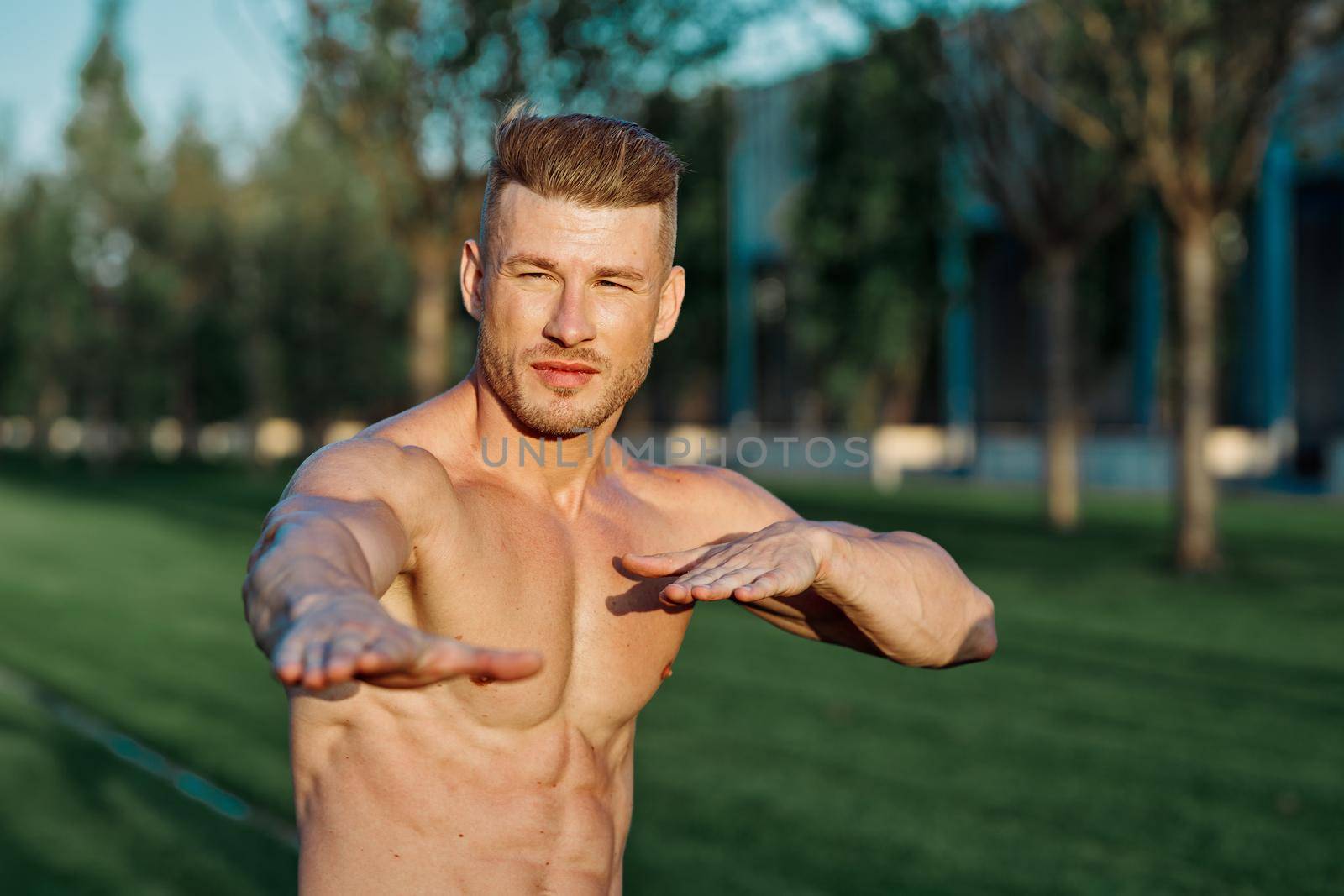 man in the park workout outdoor exercise by Vichizh