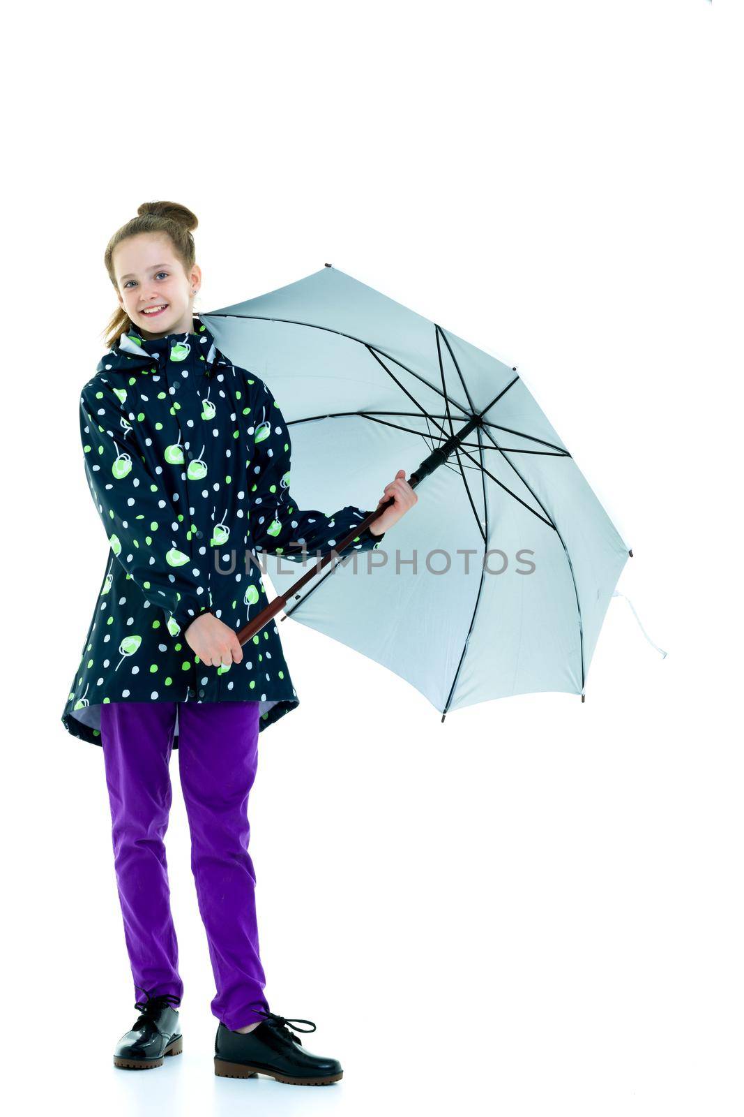 Beautiful little girl with umbrella. Concept of weather, climate change. Isolated on white background