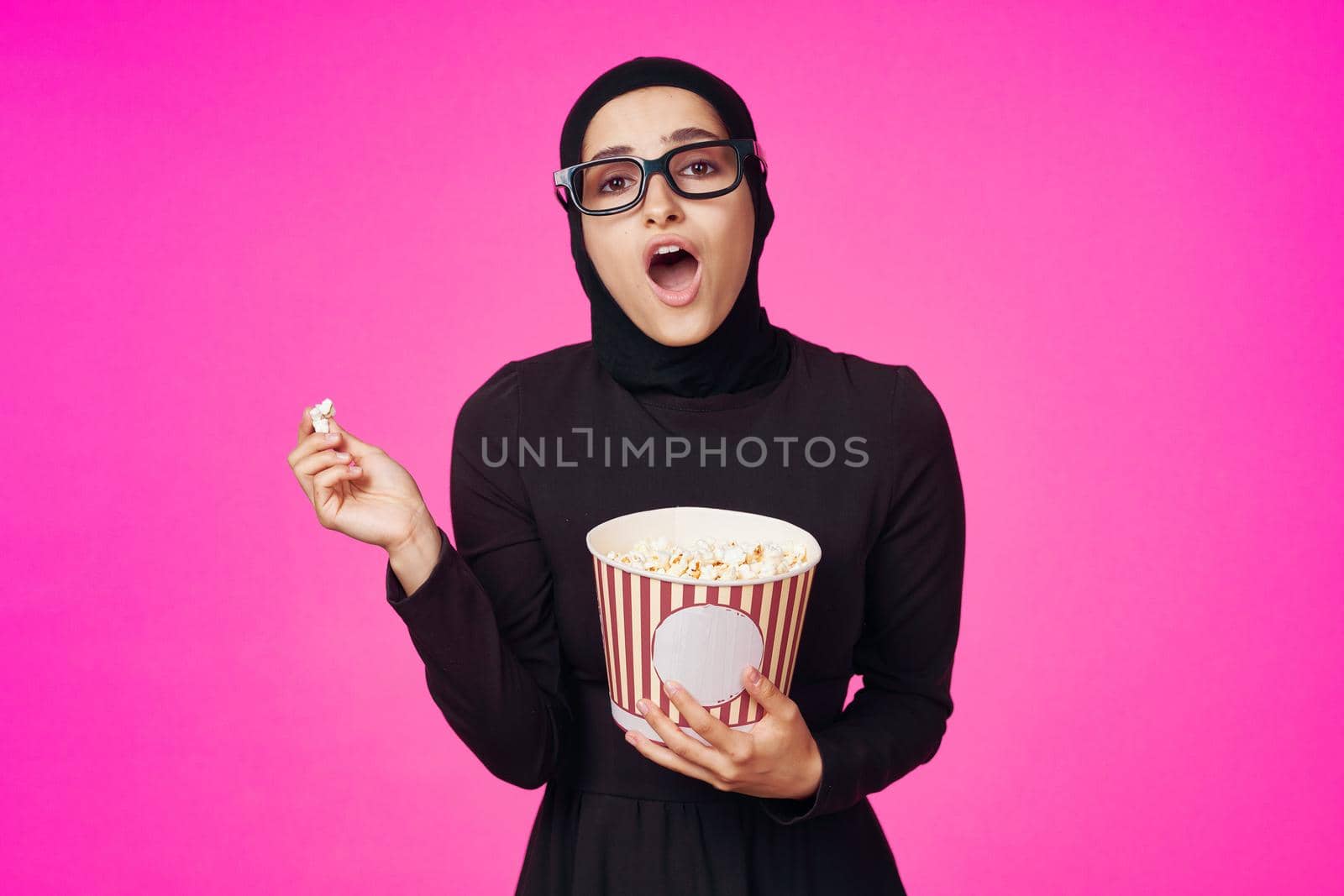 pretty woman entertainment cinema popcorn fashion isolated background. High quality photo