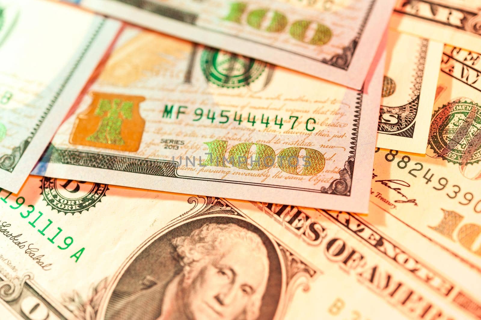Close-up view of cash money american dollars bills background. Finance and business concept. Close-up. Shallow depth of field.