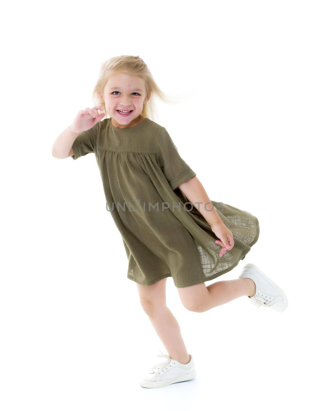 Cute little girl fun running around the room. The concept of family values, the game. Isolated on white background.