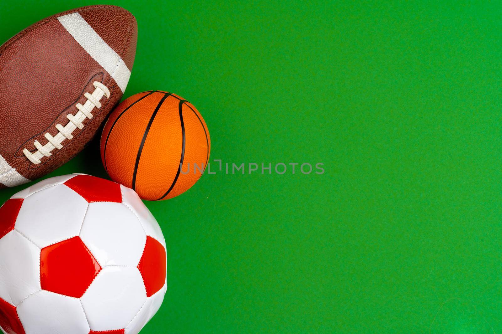 Set of balls for soccer, basketball and rugby. Close up.