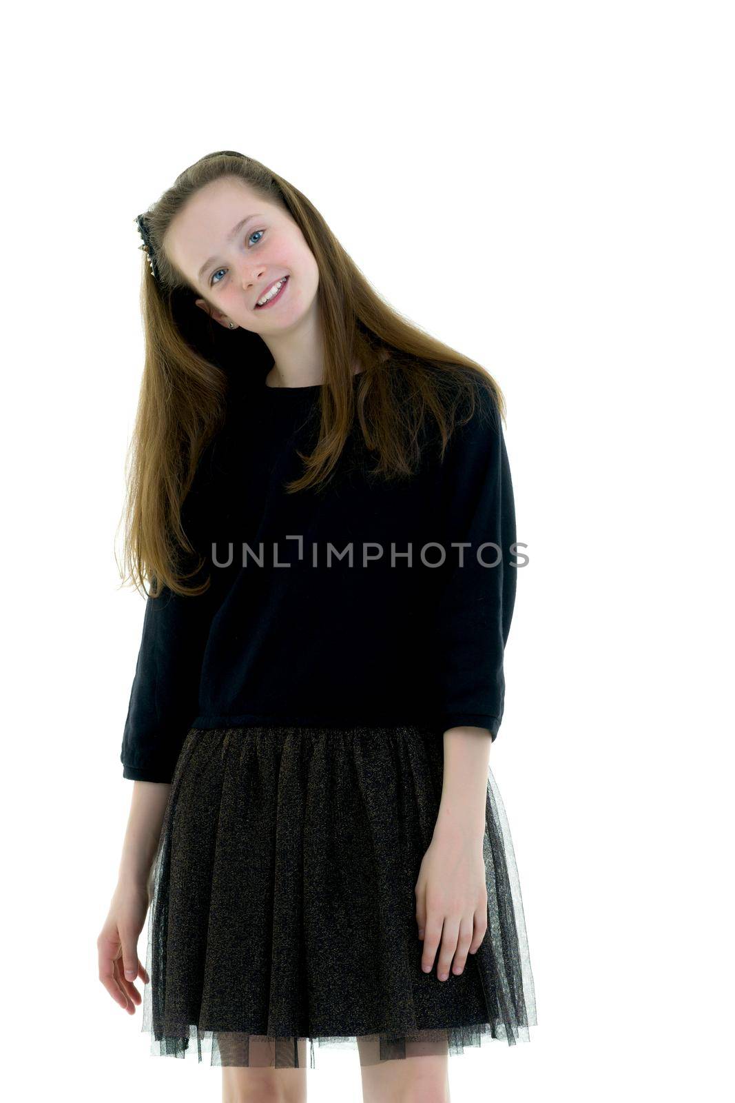 Schoolgirl teenage girl studio portrait close-up. Isolated on white background