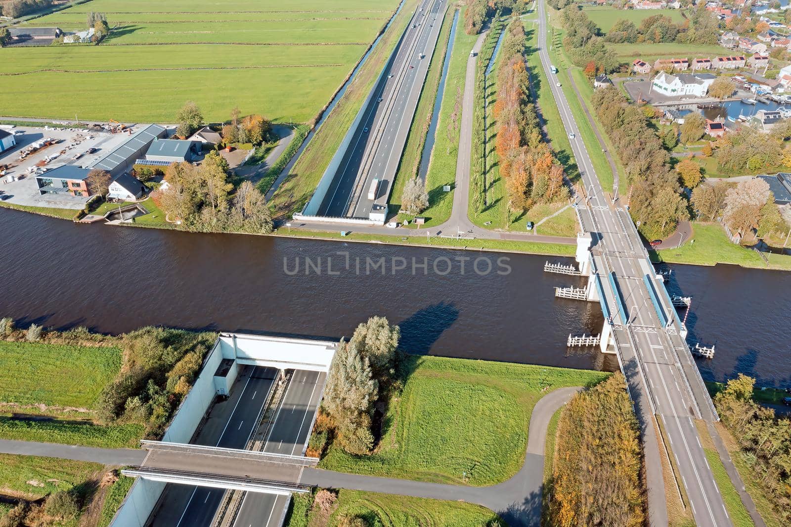 Aerial from the Princes Margriet Aquaduct at the highway A7 near Uitwellingerga in the Netherlands by devy