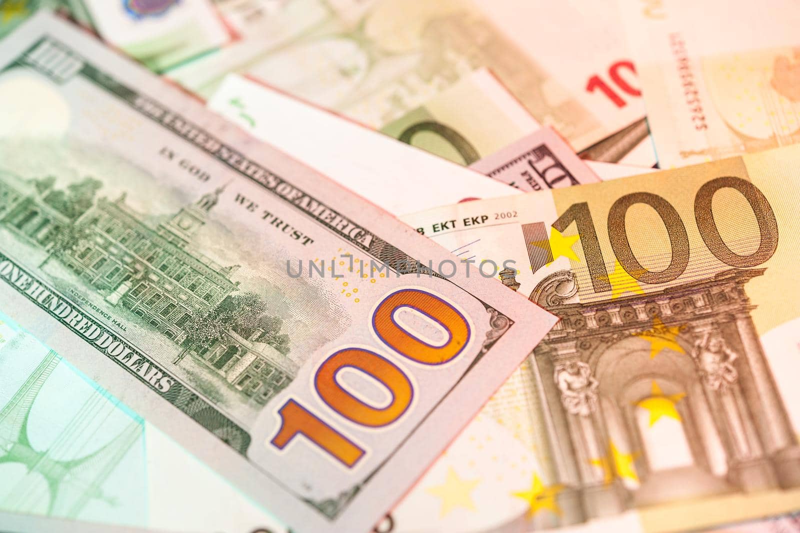 Close-up view of cash money euro and dollars bills background. Finance and business concept. Close-up. Shallow depth of field.