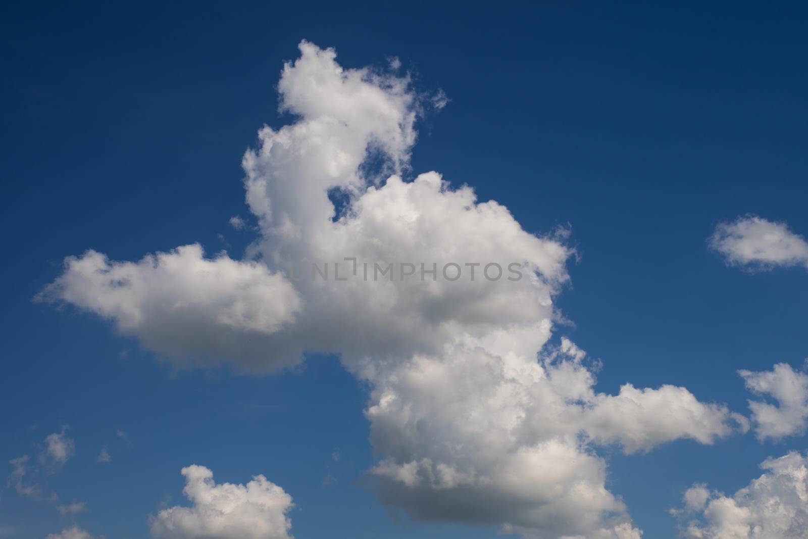 Incredibly beautiful clouds against a sunny blue sky. - Image