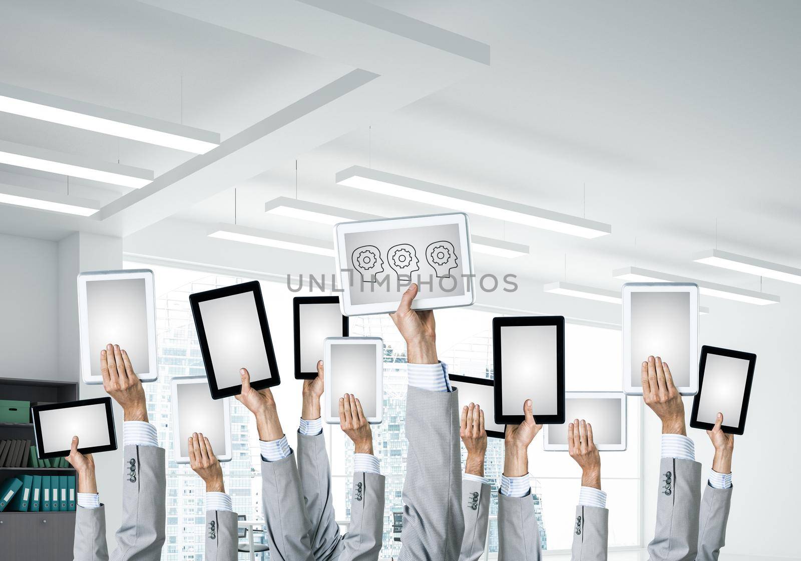 Set of tablets in male hands in modern office interior. 3d rendering