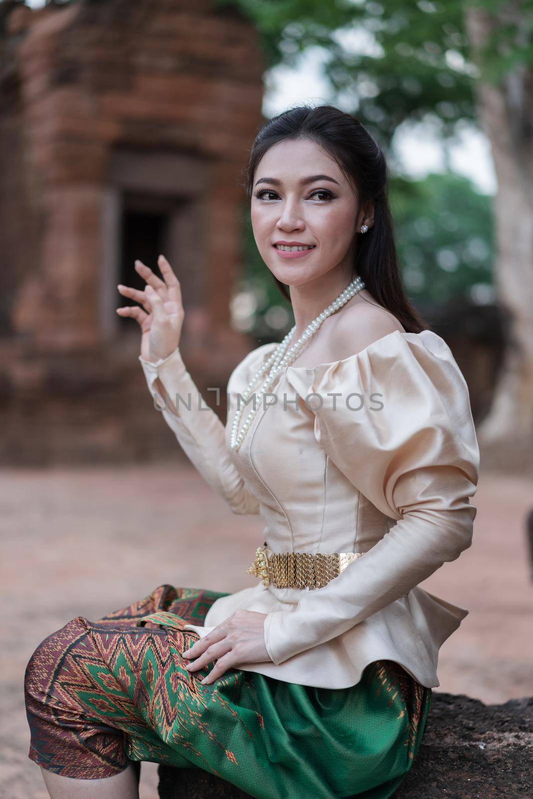 happy beautiful woman in Thai traditional dress 