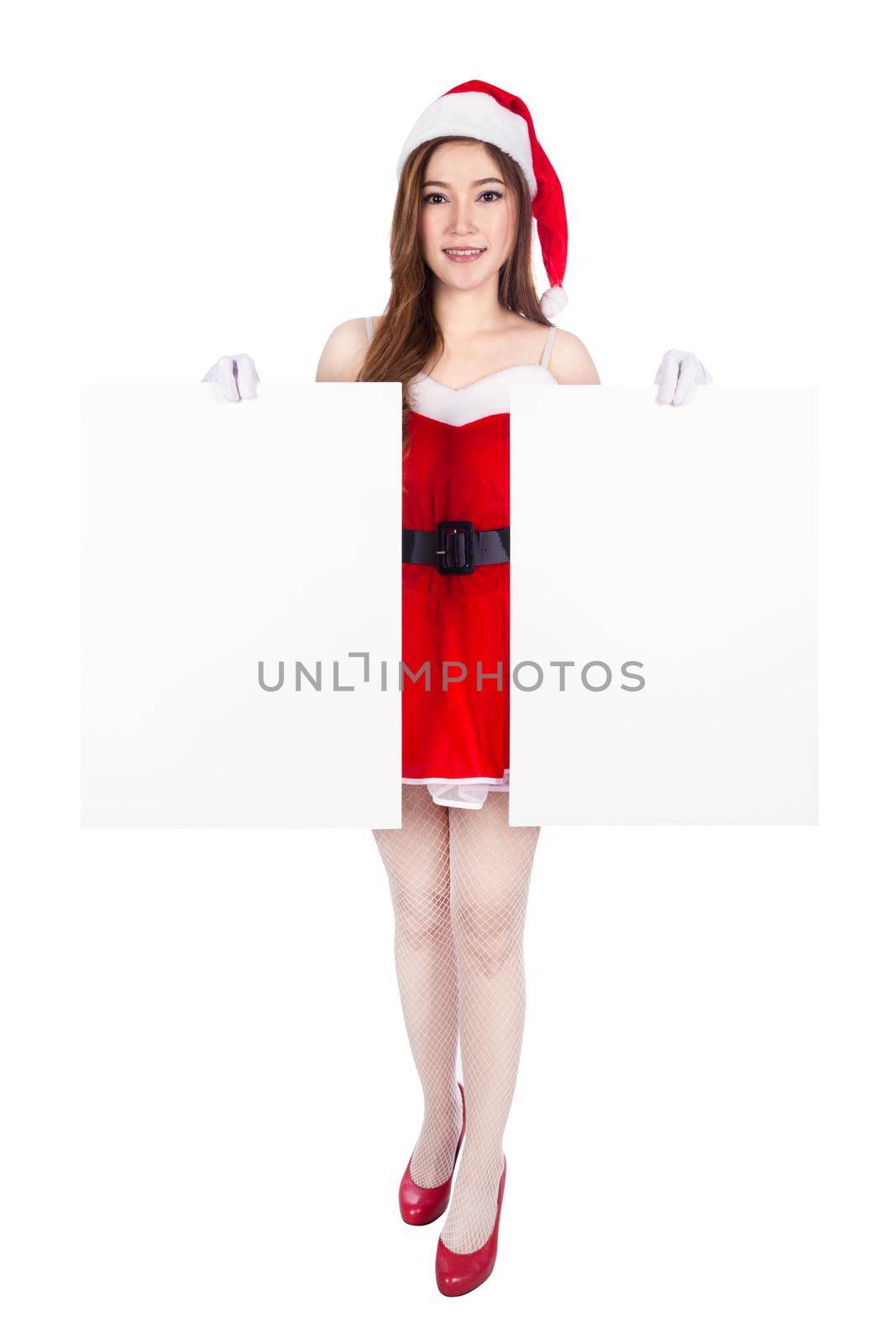 beautiful sexy woman wearing santa claus clothes with blank sign isolated on white background