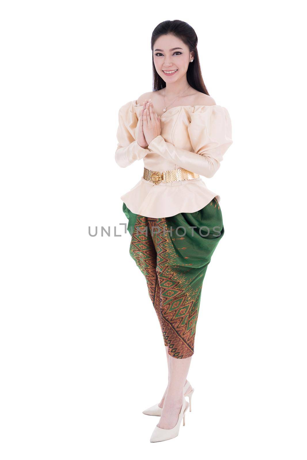 happy woman in Thai traditional dress is pay respect isolated on white background