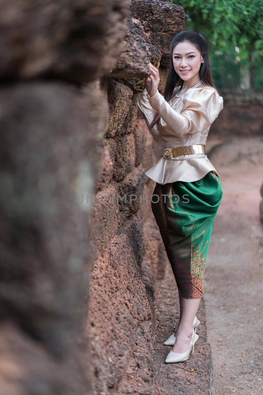 happy beautiful woman in Thai traditional dress 