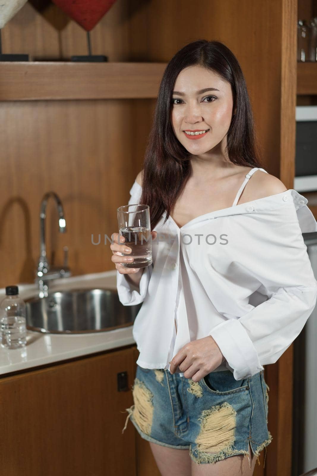 beautiful woman drinking a water by geargodz