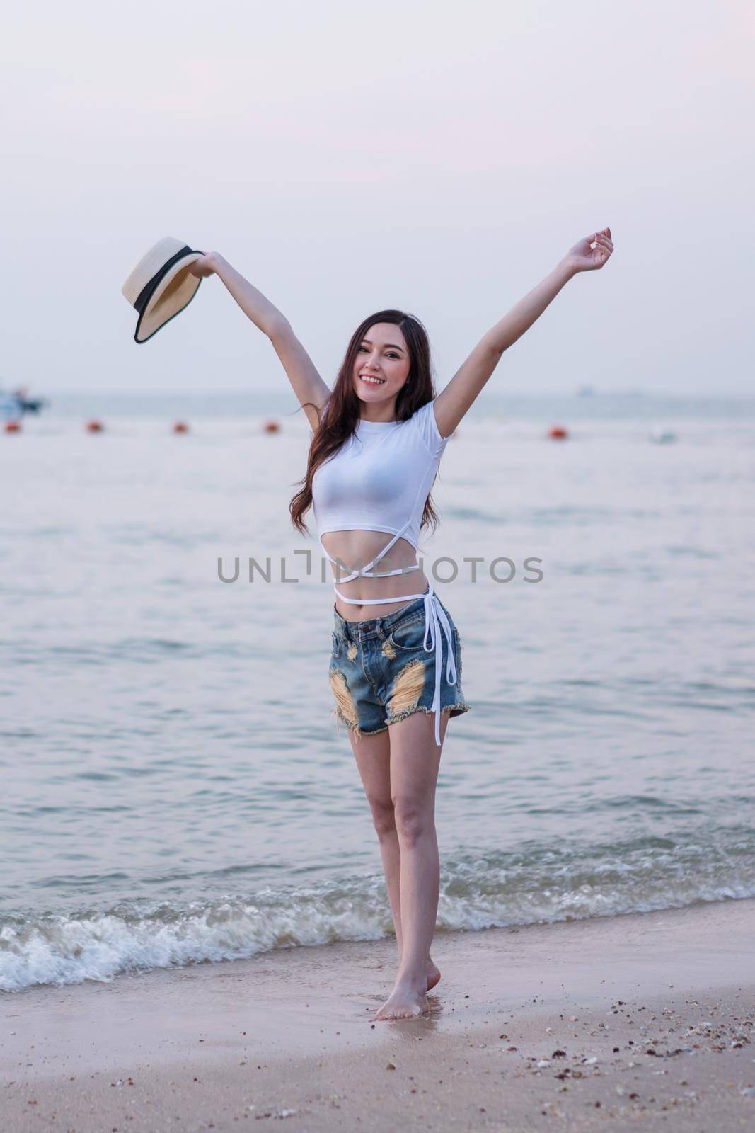 portrait of woman enjoy on sea beach by geargodz