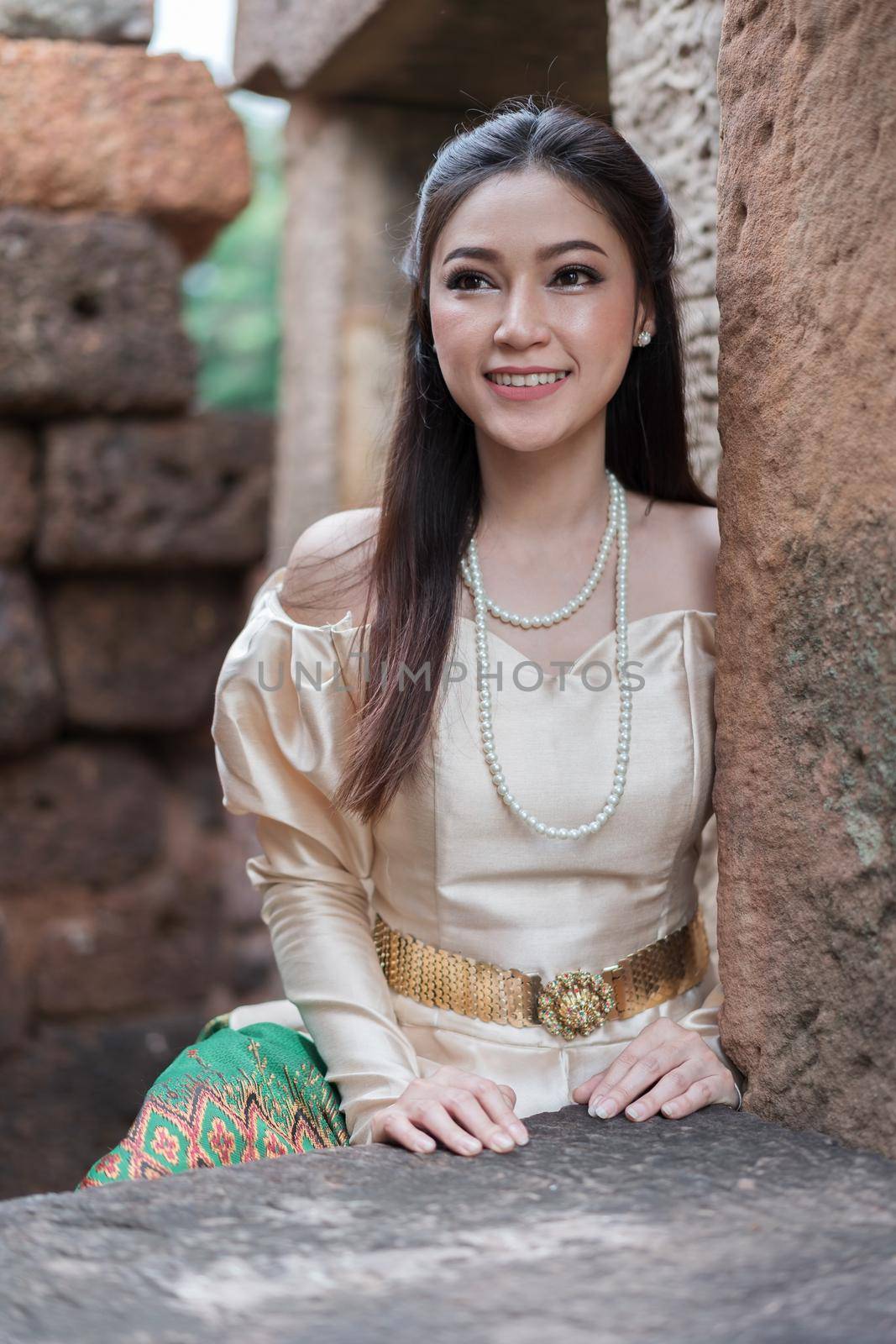 happy beautiful woman in Thai traditional dress 