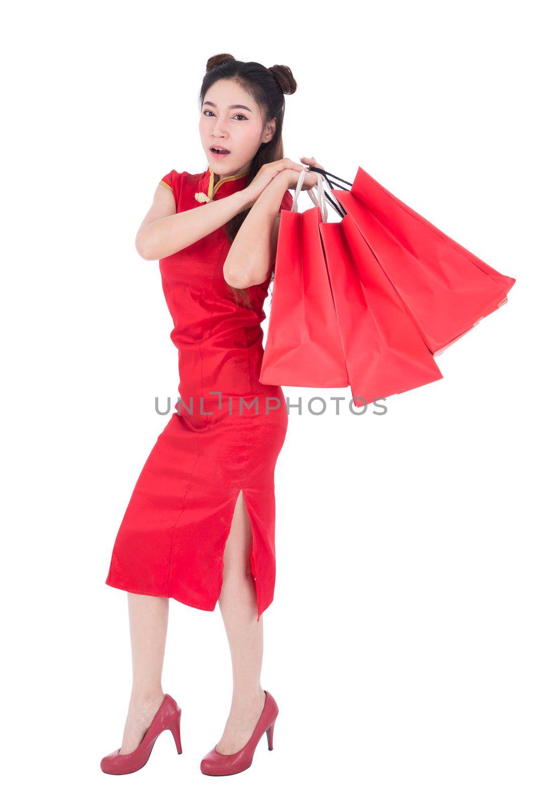 woman holding shopping bag on chinese new year celebration isolated on white background by geargodz