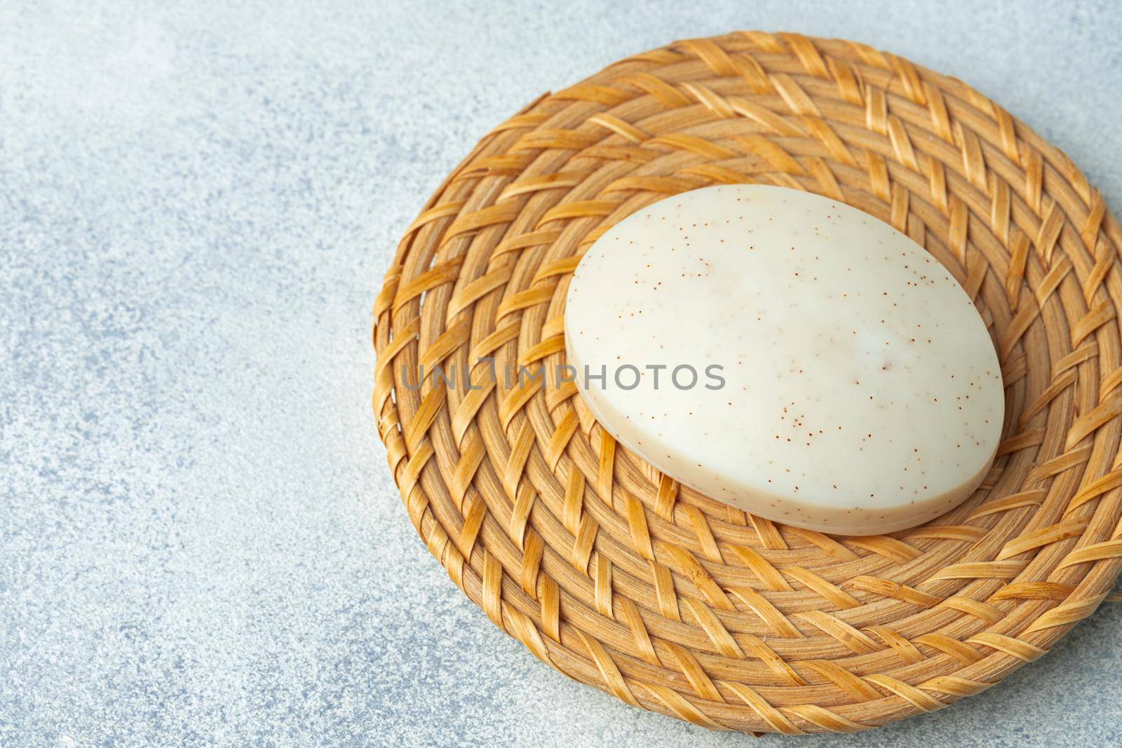 Soap bars with natural ingredients on the table, close up.