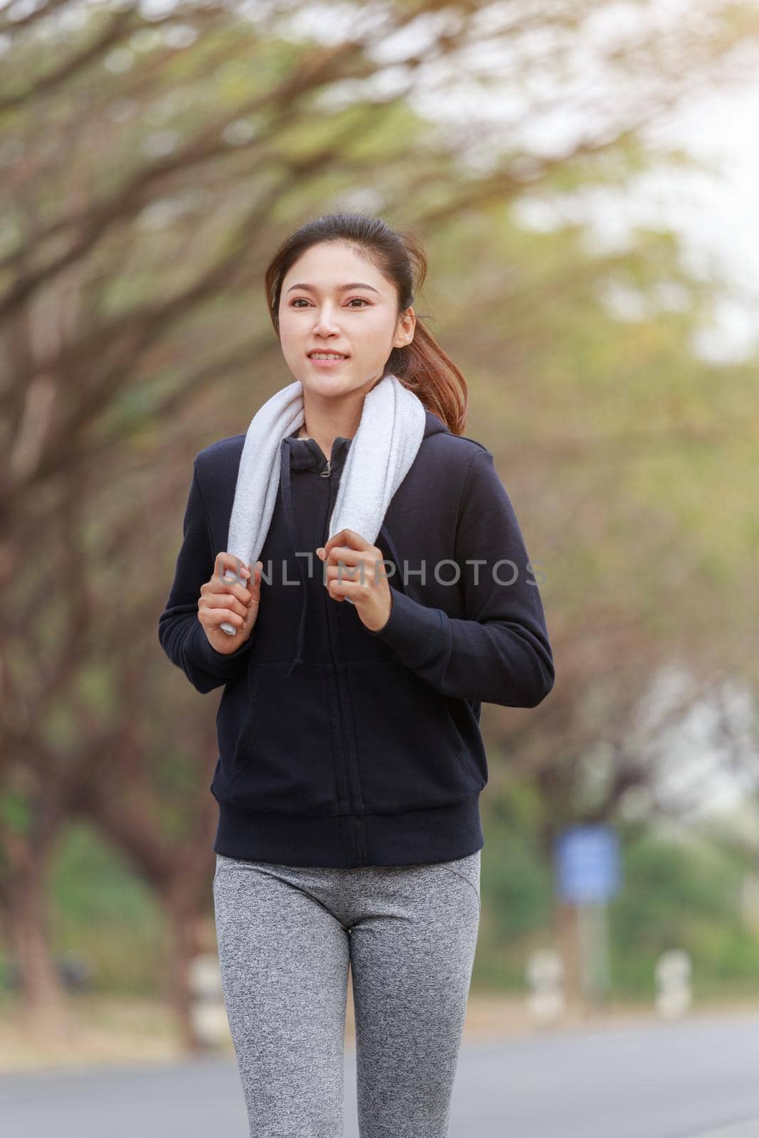 fitness woman running in the park by geargodz