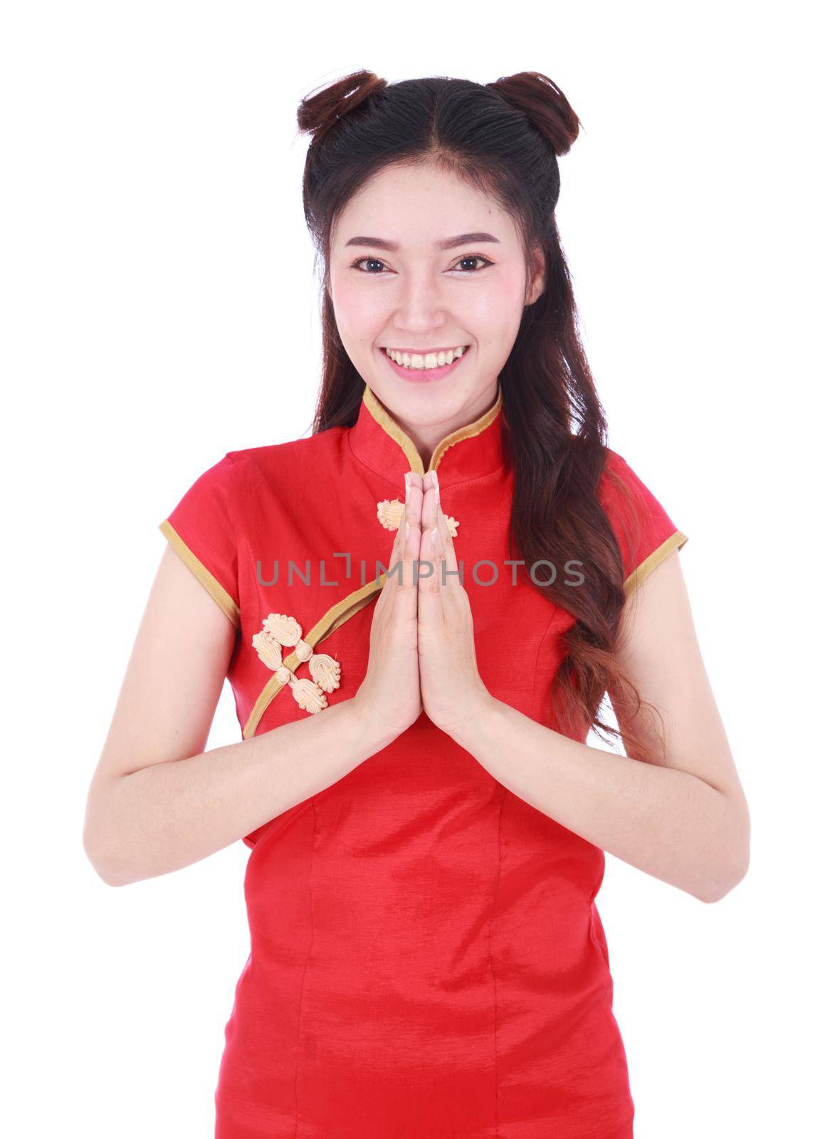beautiful woman wear red cheongsam and pay respect in concept of happy chinese new year isolated on white background