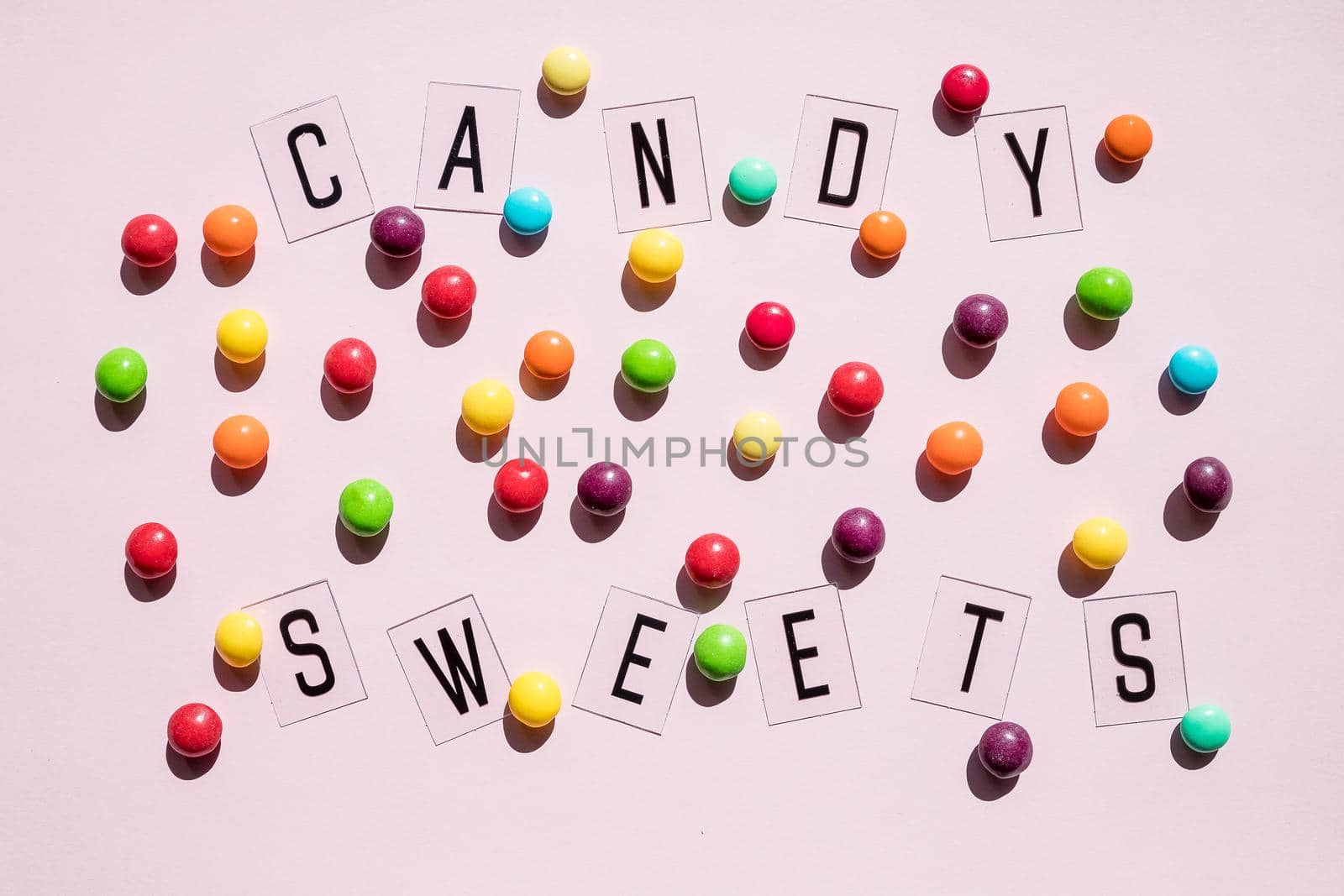 Birthday Concept - Holiday Food Top View Various Sweet Candies on White Background. Fun Decoration.