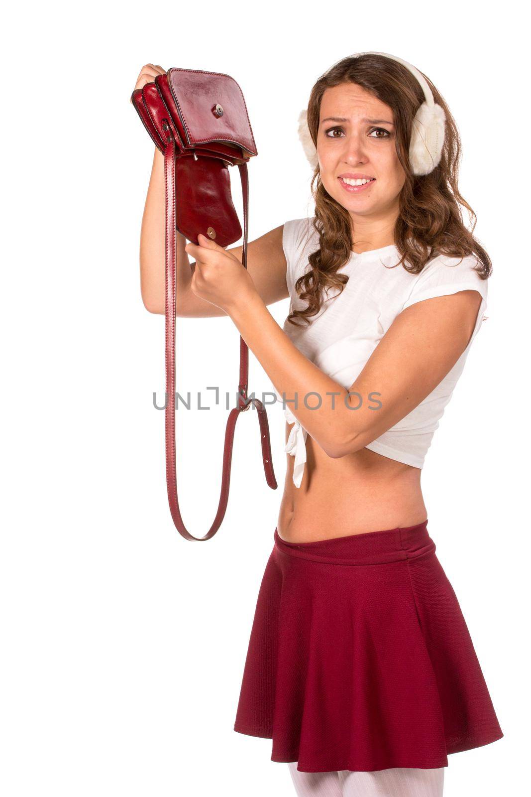 Beautiful woman looking through her pocket book purse, isolated