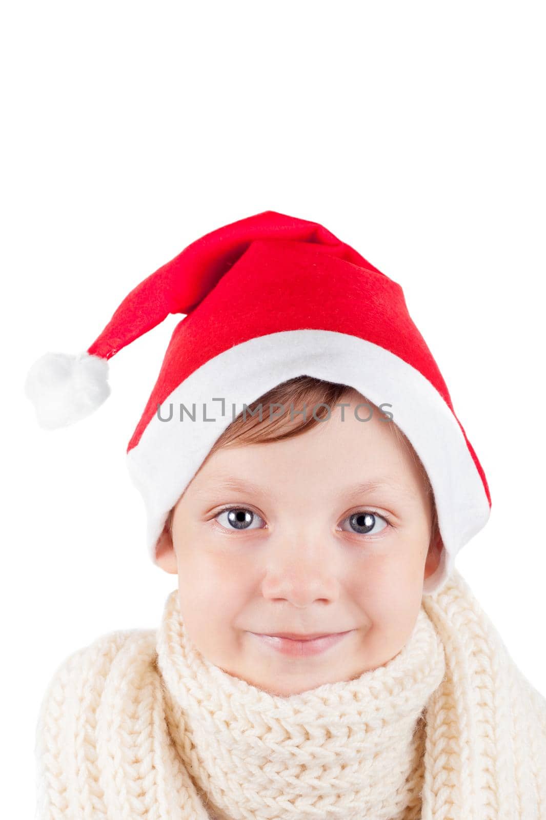 cute little boy wearing Santa Claus cap